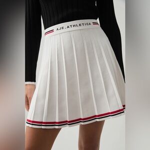 White Pleated Skirt with Red and Black Trim
